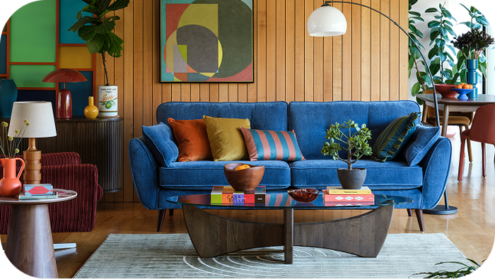 blue sofa in a retro themed room