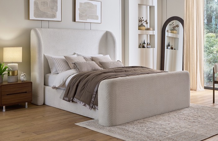 Large cream coloured bedframe