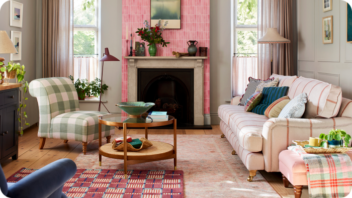 Traditional Arundel sofa in clay stripe with green check accent chair with a pink back drop