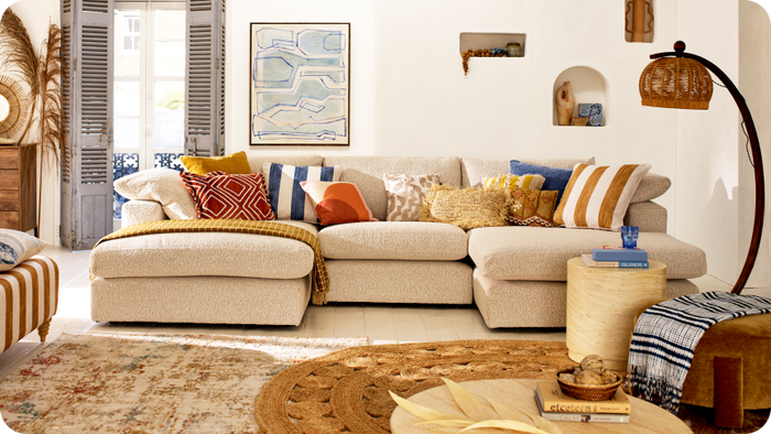 Cream Lenora double ended chaise with blue, orange and yellow accents