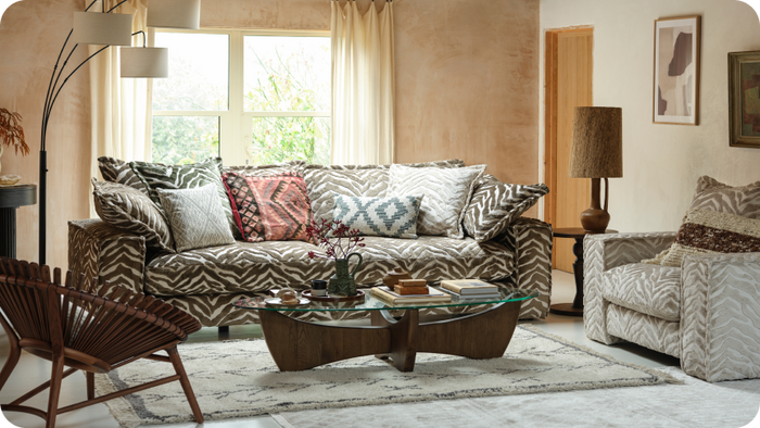 Zebra print sofa in a safari themed room