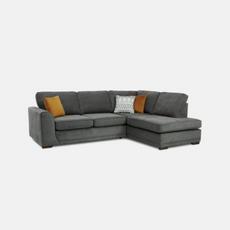 Grey corner sofa with orange and white scatter cushions