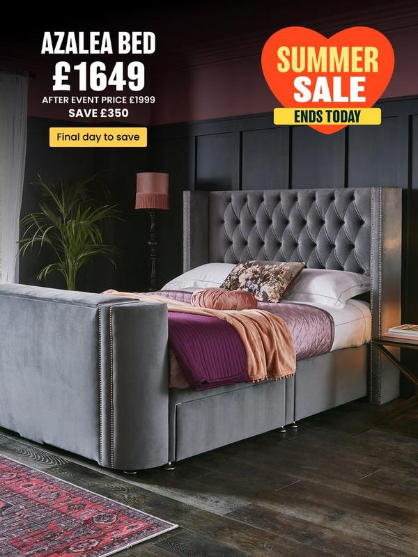 Grey tv bed with button back detail on headboard