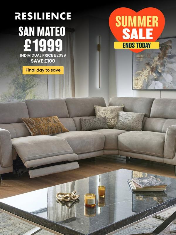 Stone coloured corner sofa with reclining features on footrest with selection of scatter cushions