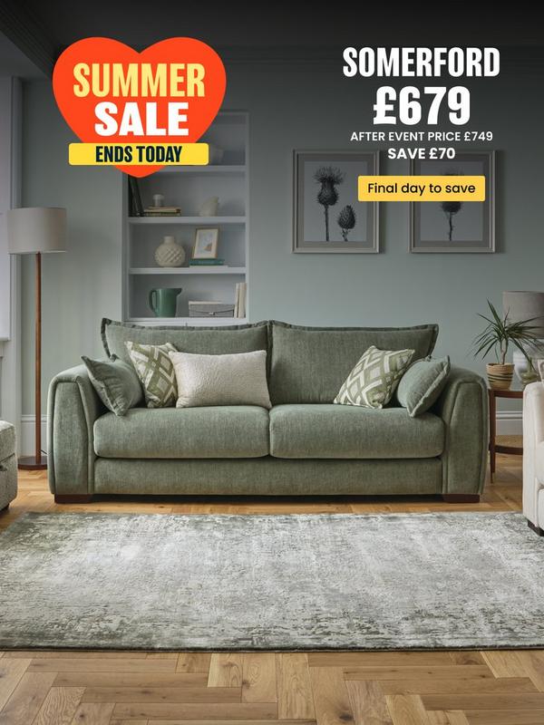 Sage green sofa with complimentary scatter cushions 