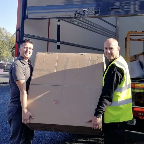 Delivery men unloading a truck