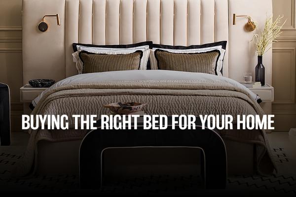 cream hotel style bed with complimenting pillows and bedding