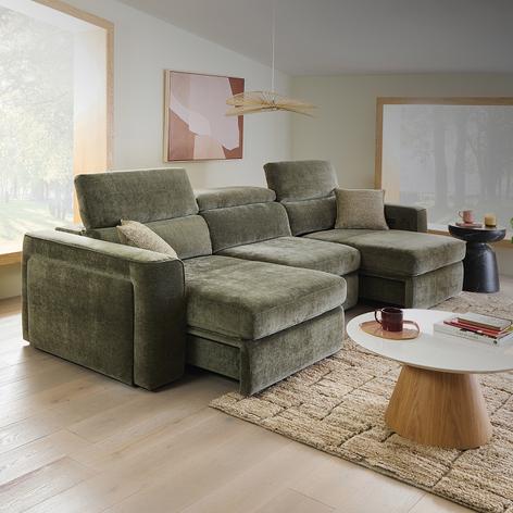 Green modular sofa on a beige textured rug