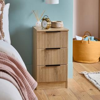 wooden panellened bedside table with black metal handles