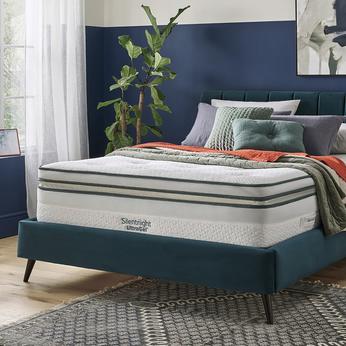 navy blue bed with a silentnight mattress