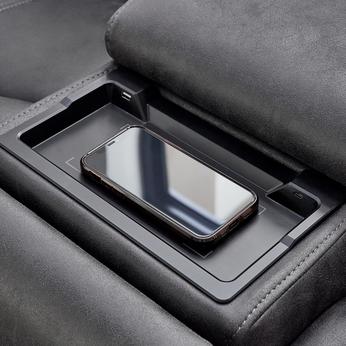 close up of a phone charging port in sofa