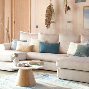 cream sofa with complimenting scatter cushions
