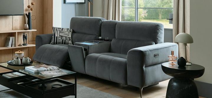 grey recliner sofa with window behind