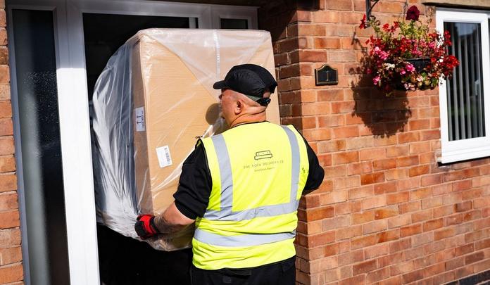 sofa deliverycompany driver delivery sofa into house