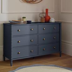 navy blue chest of drawers with gold handles