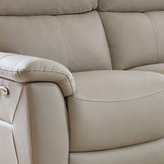 Close up shot of heated beige leather sofa seats
