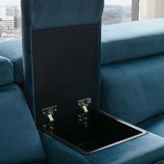Close up of a hidden storage within a corner sofa