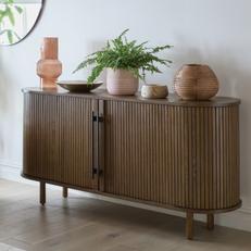 walnut panelled sideboard with black metal handles 