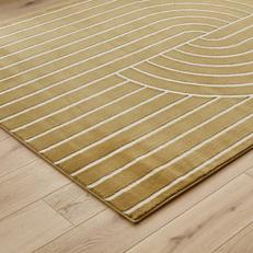 close up of a yellow patterned rug