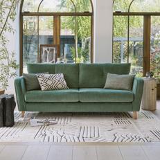 French Connection Carlisle Sofa in Sage Green with monochrome rug
