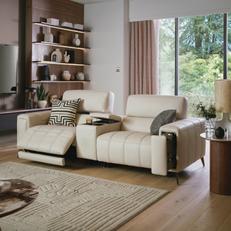 Cinesound Showcase in Leather in a dark wood living space and monochrome rug