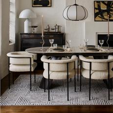 Black and white dining set with boucle chairs