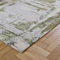 green and white patterned rug