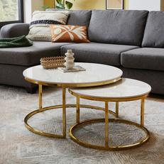 Round nest coffee table with gold metal legs and marble top