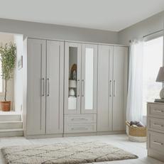 Cream wardrobes with silver handles and mirrored doors