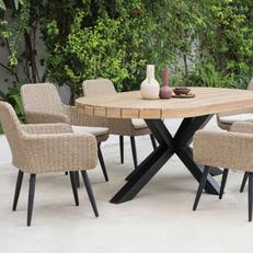 Round wooden garden dining set with cream rattan chairs and black metal legs