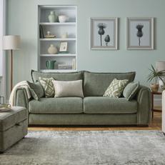 dfs somerford sofa in sage green against a light green wall and green rug