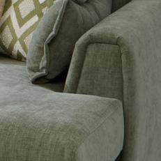 Sage green fabric with french seam and a green patterened scatter