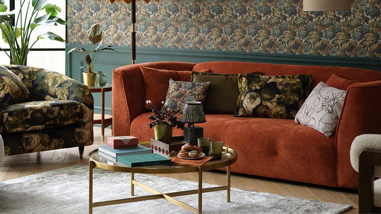 Ted Baker Grove in rust with a floral accent chair and a gold accent chair
