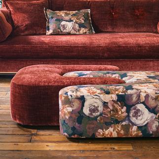 Interlocking ying yang style footstool one in red chenille the other in floral pattern