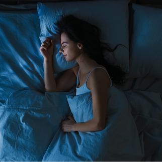 women sleeping in a bed