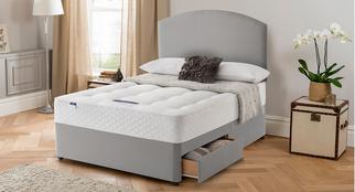 Silentnight Open Coil mattress on a grey divan bed with drawers 