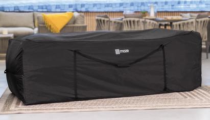 Black storage bag for garden or outdoor accessories on a outdoor beige rug