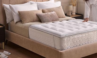 Beige dian bed with a silentnight mattress,topper and range of pillow cases