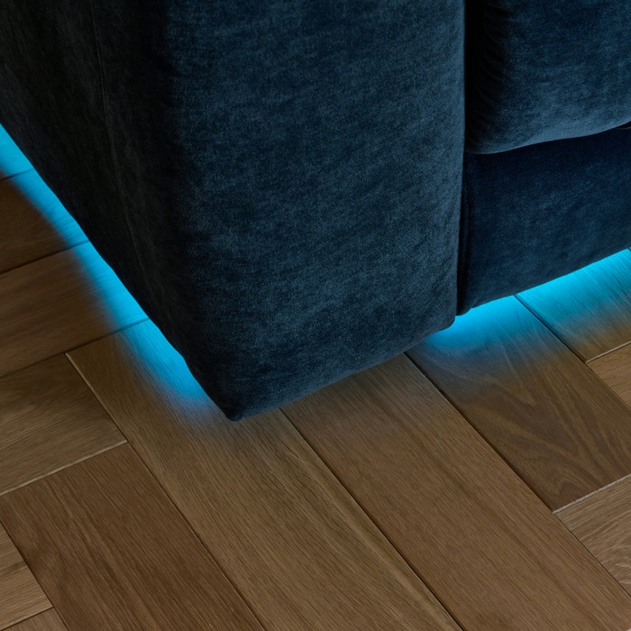 blue led light strip underneath the sofa