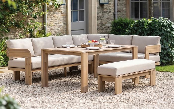 Outdoor wooden corner dining sets with beige cushions and matching bench