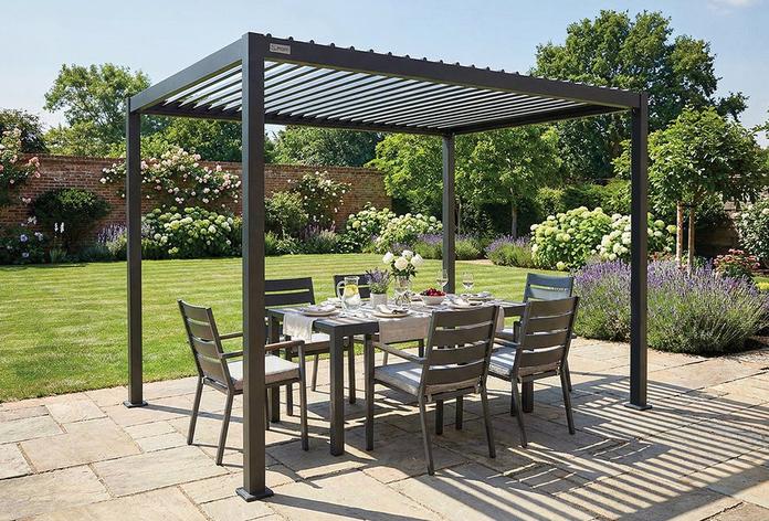 Marrakesh Black metal pergold in a garden garden dining set 