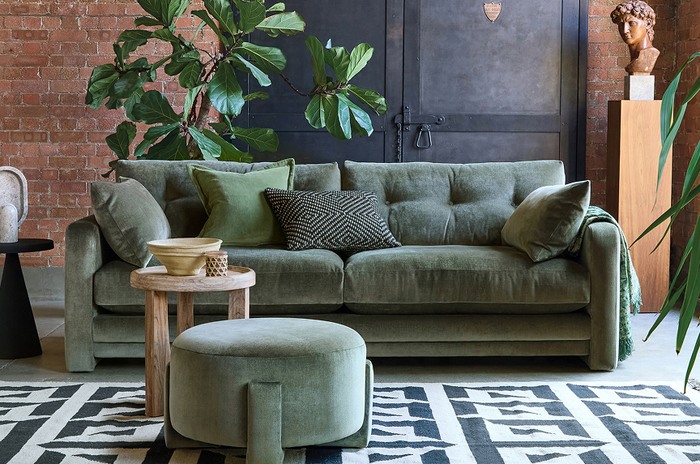French Connection Molten sofa in green with matching round footstool and oak side table