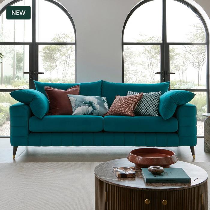 Ted Baker Farringdon sofa in teal with colourful scatter cushions