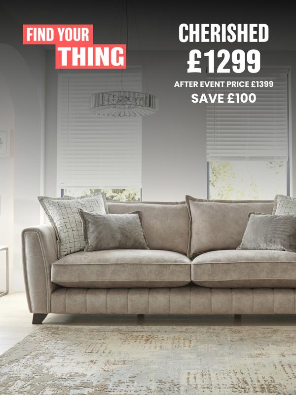 Beige sofa in a neutral room with windows behind