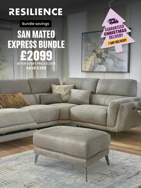 Stone coloured corner sofa with reclining features on footrest with selection of scatter cushions