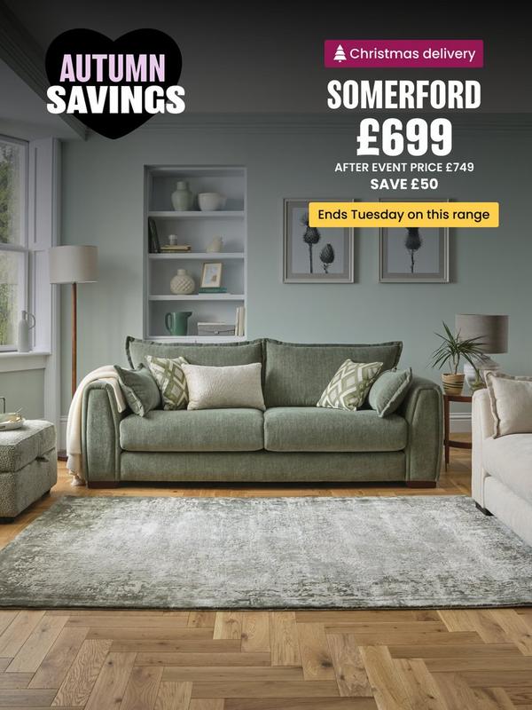 Sage green sofa with complimentary scatter cushions 