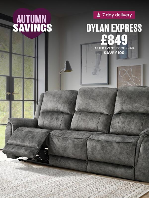 dark grey fabric recliner sofa next to fireplace