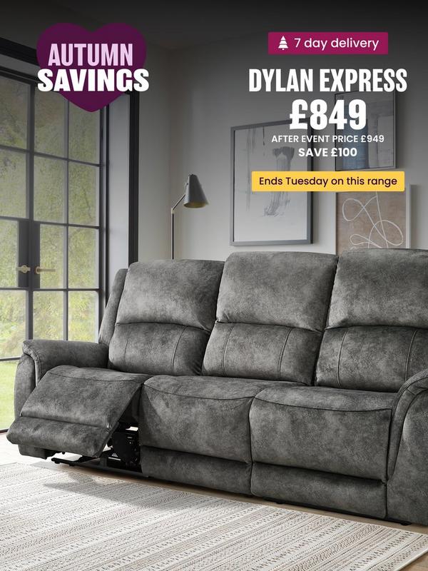 dark grey fabric recliner sofa next to fireplace