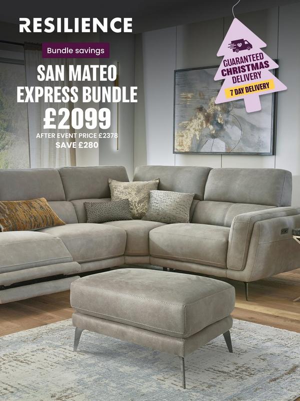 Stone coloured corner sofa with reclining features on footrest with selection of scatter cushions