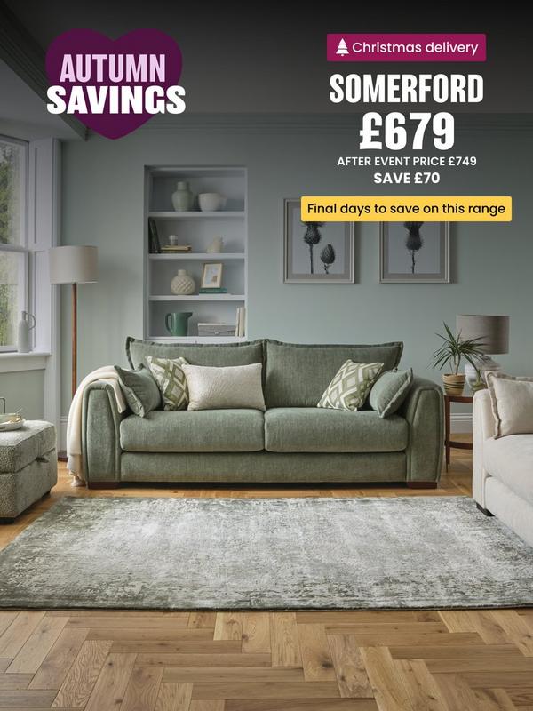 Sage green sofa with complimentary scatter cushions 